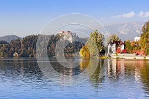 Colorful autumn at Lake Bled, SLovenia. Bled castle on background