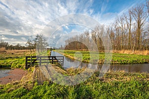 Colorful autumn landscape with a wooden gate