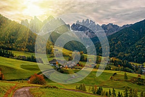 Colorful autumn scenery in Santa Maddalena village at sunrise. Dolomite Alps, South Tyrol, Italy.