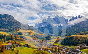 Colorful autumn scenery in Santa Maddalena village at sunny day. Dolomite Alps, South Tyrol, Italy