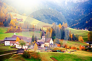 Colorful autumn scenery in Santa Maddalena village at sunrise. Dolomite Alps, South Tyrol, Italy.