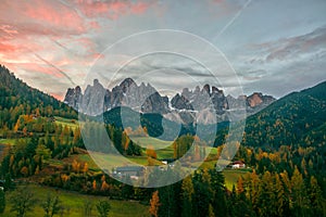 Colorful autumn scenery in Santa Maddalena village at sunrise. Dolomite Alps, South Tyrol, Italy.