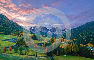 Colorful autumn scenery in Santa Maddalena village at sunrise. Dolomite Alps, South Tyrol, Italy.