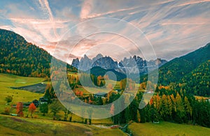 Colorful autumn scenery in Santa Maddalena village at sunrise. Dolomite Alps, South Tyrol, Italy.