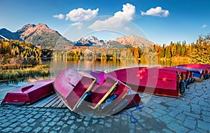 Colorful autumn view of Strbske pleso lake. Splendid evening scene of High Tatras National Park, Slovakia, Europe. Beauty of natur