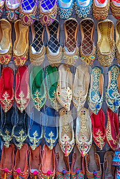 Colorful babouche slippers in Dubai souks, UAE