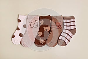 Colorful baby kid socks , different print color for boy and girl. Cloth textile.