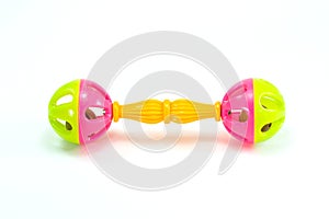 A colorful baby rattle on a white horizontal background