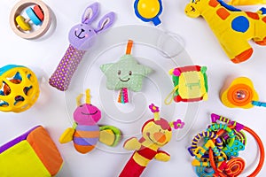 Colorful baby toys on white