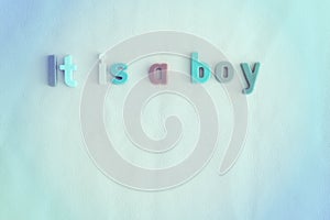 Colorful background for baby boy with letters. It is a boy.