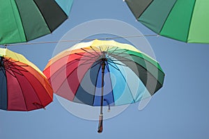 Colorful background of the haning umbrella photo