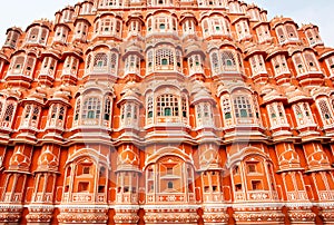 Colorful balconies of Hawa Mahal in Jaipur, India. 18th century Palace of Winds with color walls