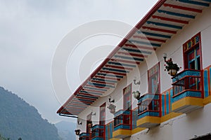 Colorful balconies and roof of a house in Jardin, Eje Cafetero, Colombia photo