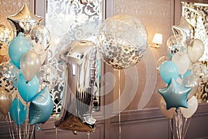 Colorful balloons background, one year. Number one. Holiday concept