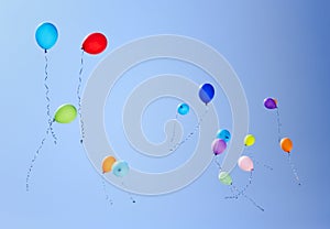 Colorful balloons on a blue sky