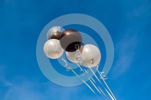 Colorful balloons in blue sky