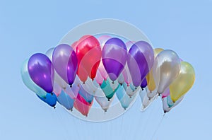 Colorful balloons with blue sky background