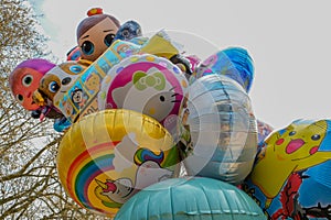 Colorful balloons on a blue sky background