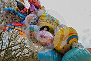 Colorful balloons on a blue sky background