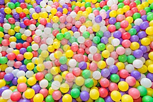 Colorful balloons in the field for small players