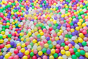 Colorful balloons in the field for small players