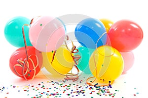 Colorful balloons, party streamers and confetti