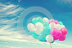 Colorful balloons with a retro instagram filter effect, concept of happy birthday in summer and wedding honeymoon