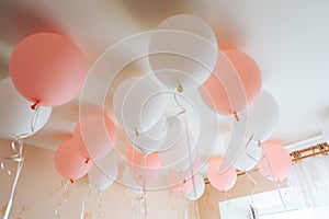 Colorful balloons in room prepared for birthday party