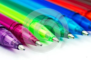 Colorful ballpoint pen on white background