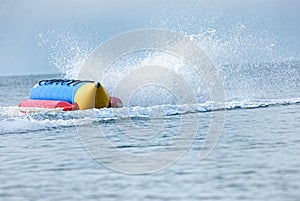 Colorful banana boat floating on the water