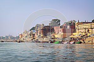 Colorful banks of holy river Ganges in one of the oldest living cities of World and spiritual capital of India, Varanasi