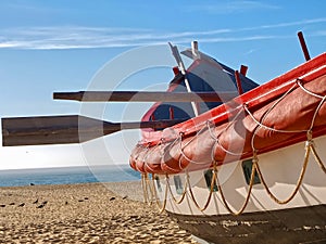 Colorful barges at the beach of n Nazare in Portugal