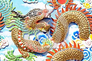 Colorful bas-relief Chinese dragon on the wall