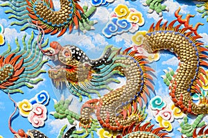 Colorful bas-relief Chinese dragon on the wall