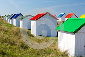 Colorful beach cabins, Normandy, France