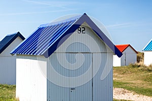 Colorful beach cabins, Normandy, France