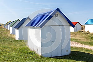 Colorful beach cabins, Normandy, France