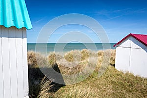 Colorful beach cabins, Normandy, France