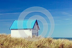 Colorful beach cabins, Normandy, France