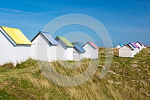 Colorful beach cabins, Normandy, France