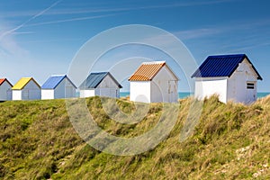 Colorful beach cabins, Normandy, France