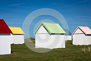 Colorful beach cabins, Normandy, France