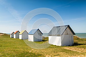 Colorful beach cabins, Normandy, France