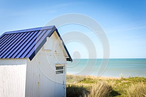 Colorful beach cabins, Normandy, France