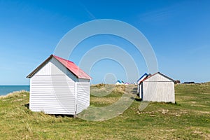 Colorful beach cabins, Normandy, France