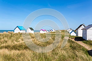 Colorful beach cabins, Normandy, France