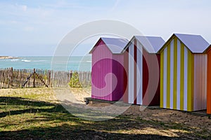 Colorful beach huts at oleron island by the Sea west french coast