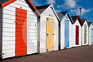 Colorful beach huts in a row at the beach
