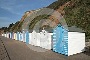 Colorful Beach Huts at Seaton, Devon, UK.