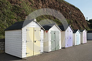 Colorful Beach Huts at Seaton, Devon, UK.